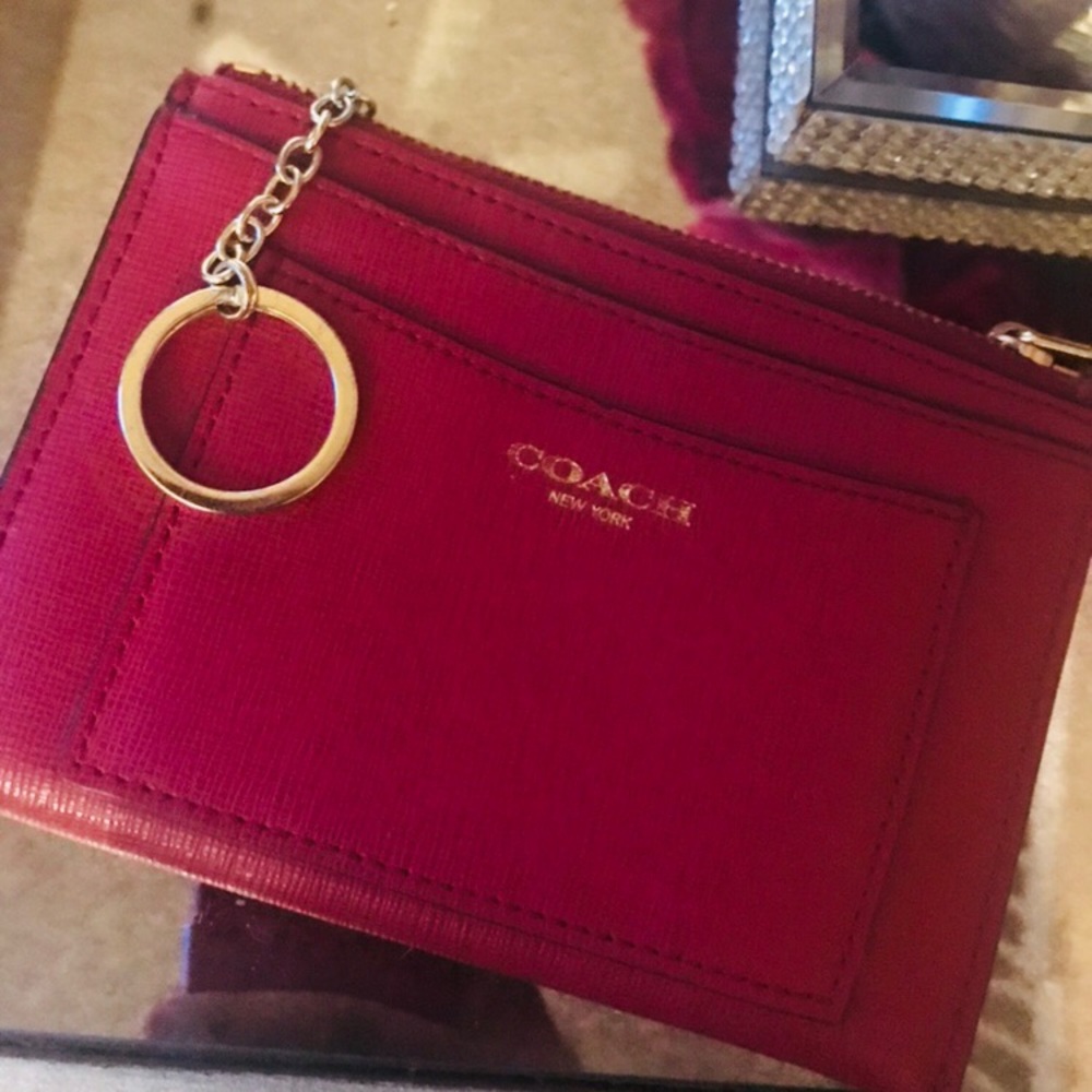 Really cute maroon coach wallet.